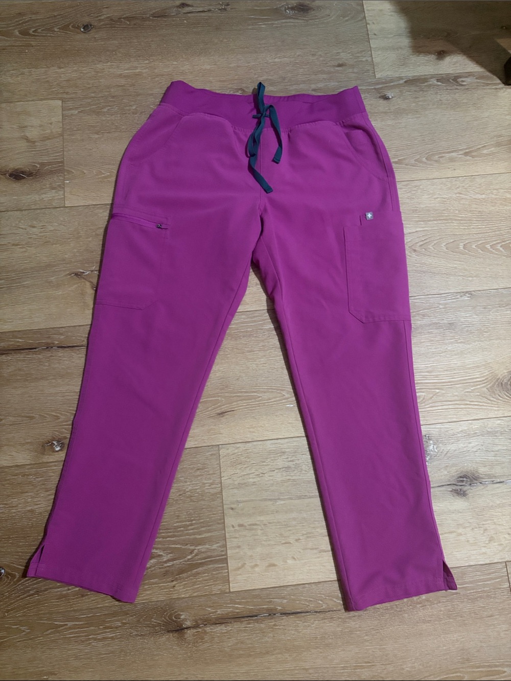 Figs Women’s Yolo Scrub Pants in Bright Fuschia.